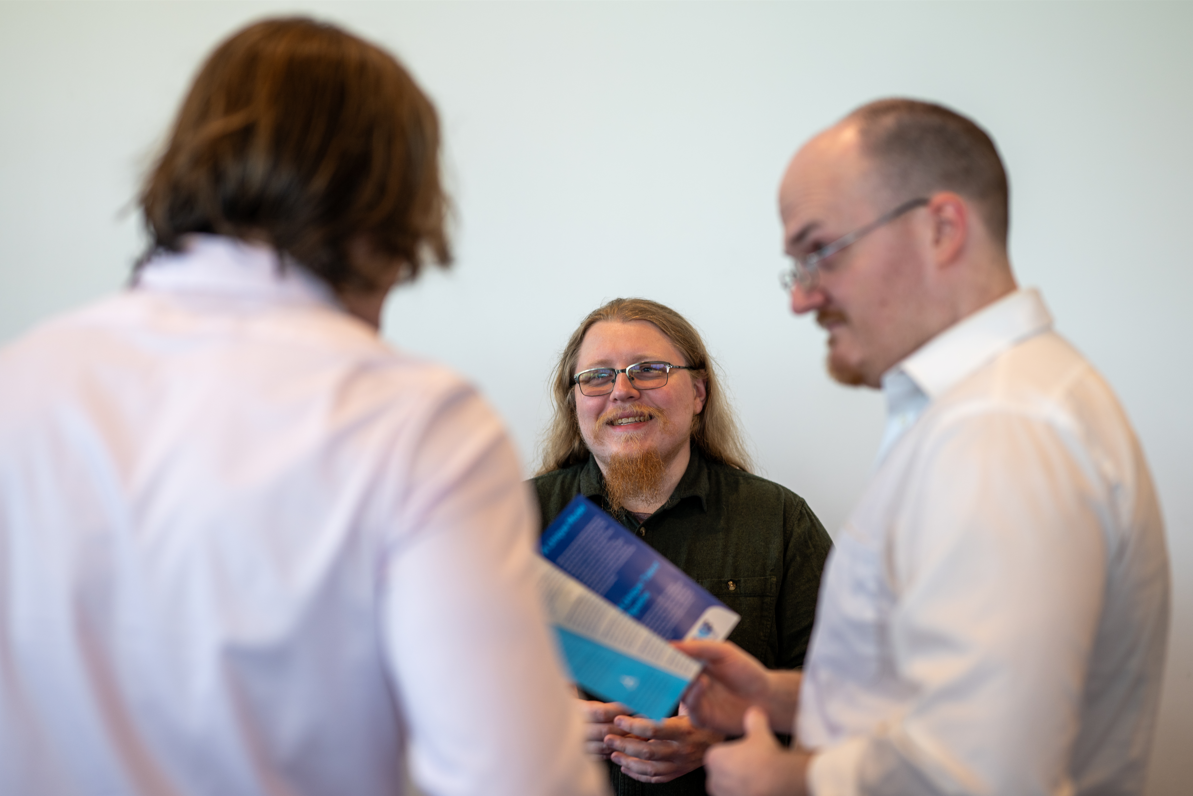 UMRF Ventures employee talking to prospective students and partners at career fair
